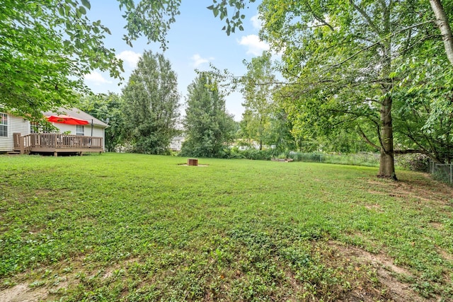 view of yard featuring a deck