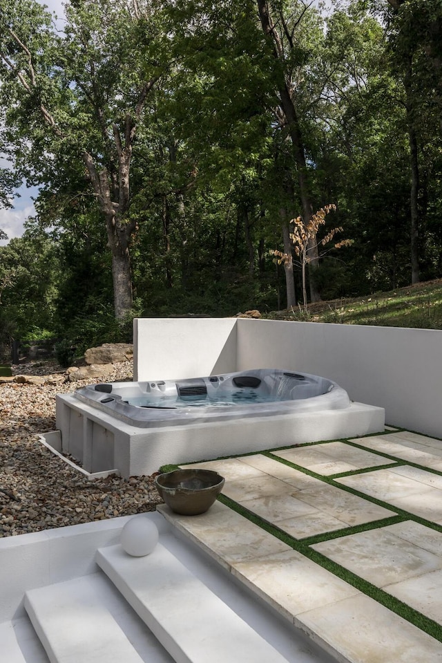 view of patio featuring a hot tub