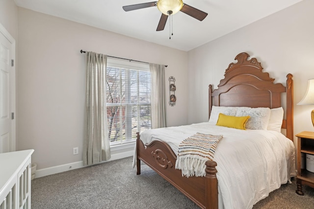 bedroom with carpet floors, multiple windows, baseboards, and a ceiling fan