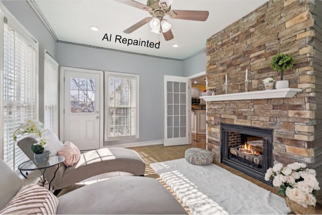 living area featuring ceiling fan, recessed lighting, a fireplace, baseboards, and crown molding