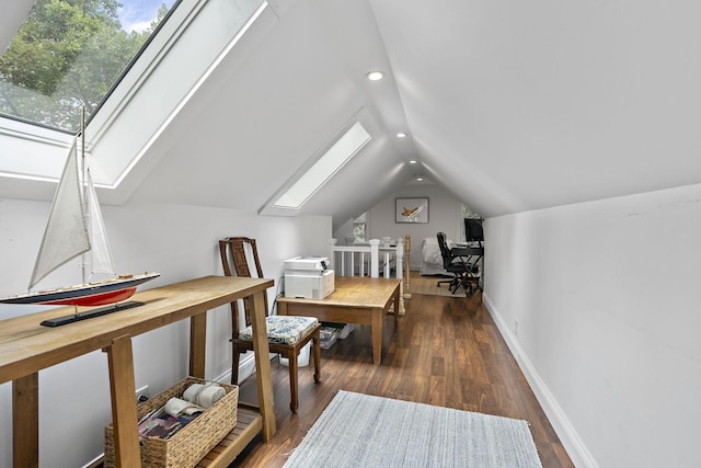 bonus room featuring dark hardwood / wood-style flooring and vaulted ceiling with skylight