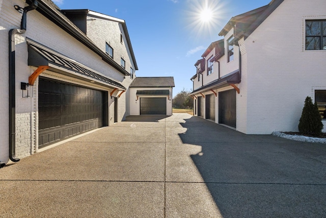 view of side of property featuring a garage