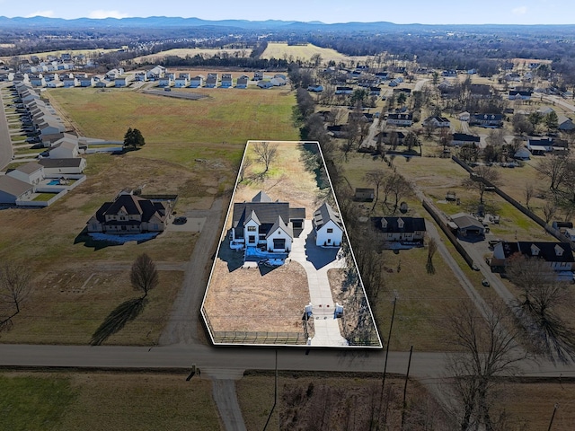 bird's eye view with a mountain view