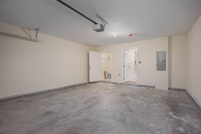 garage featuring electric panel and a garage door opener