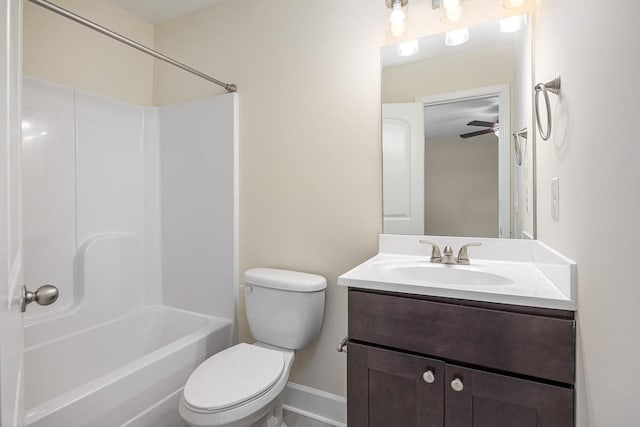 full bathroom featuring ceiling fan, vanity, tub / shower combination, and toilet