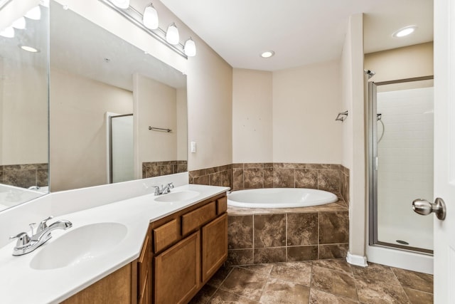 2016 Shamrock Dr, Spring Hill, TN 37174 - bathroom with a stall shower, a bath, and double vanity