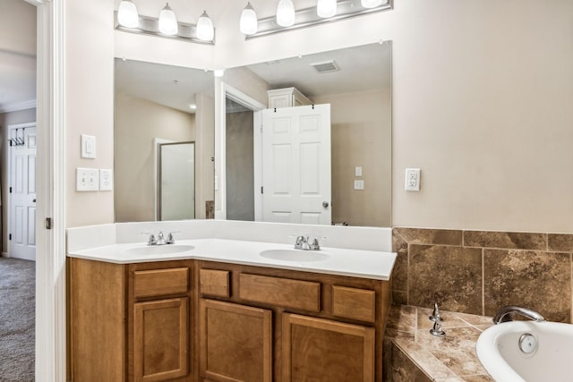 2016 Shamrock Dr, Spring Hill, TN 37174 - full bathroom with a shower stall, double vanity, and a garden tub