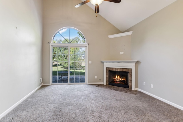 2016 Shamrock Dr, Spring Hill, TN 37174 - unfurnished living room featuring high vaulted ceiling, carpet, ceiling fan, and a tiled fireplace