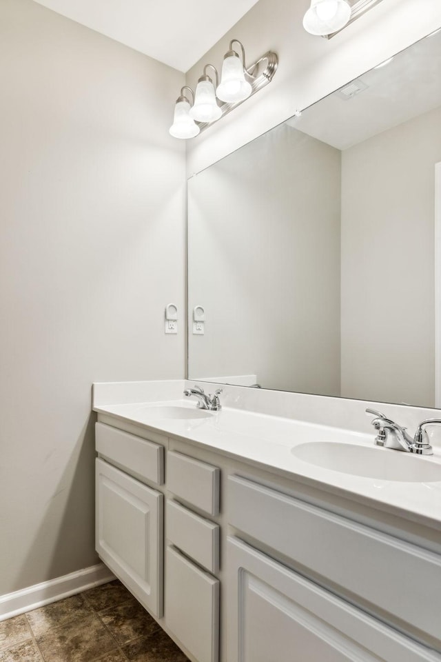 2016 Shamrock Dr, Spring Hill, TN 37174 - bathroom with double vanity and baseboards
