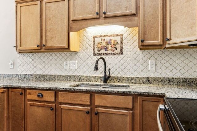 2016 Shamrock Dr, Spring Hill, TN 37174 - kitchen with decorative backsplash, stainless steel electric range oven, and light stone counters