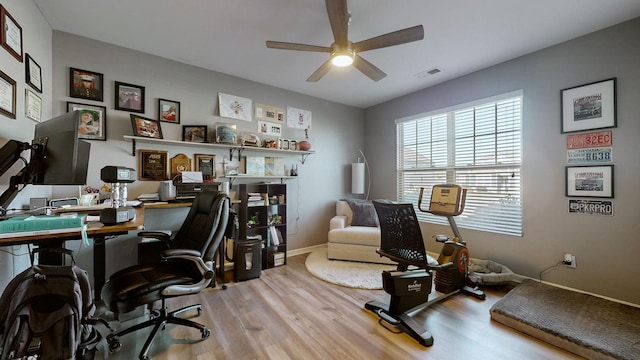 home office featuring ceiling fan and hardwood / wood-style floors