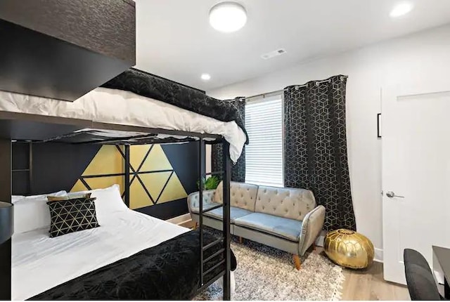 bedroom with light wood-type flooring