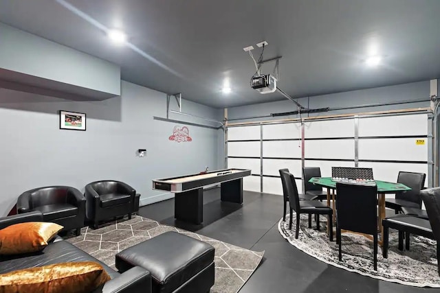 playroom with billiards and concrete floors