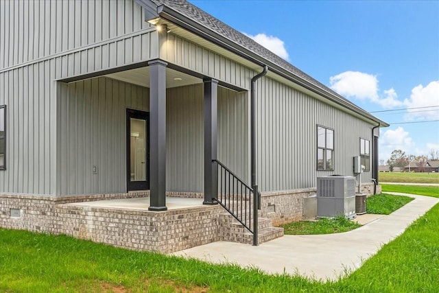 exterior space featuring covered porch and cooling unit