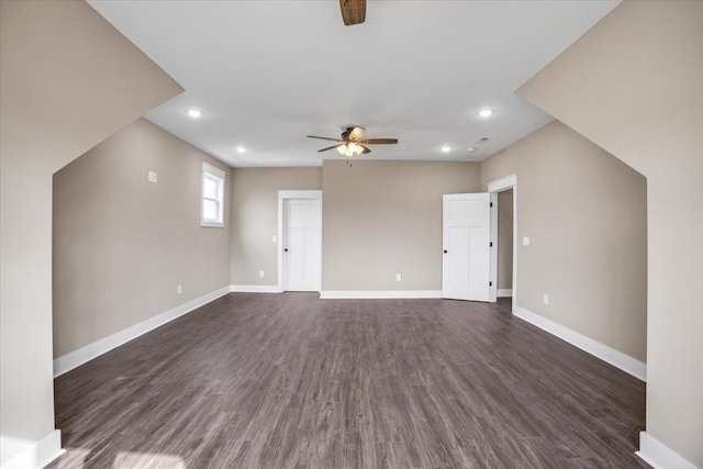 bonus room featuring dark hardwood / wood-style flooring and ceiling fan