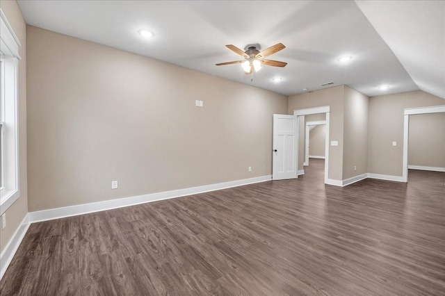 interior space with dark hardwood / wood-style floors and ceiling fan