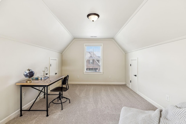 carpeted office space featuring lofted ceiling