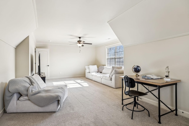 office space featuring light colored carpet, ceiling fan, and ornamental molding