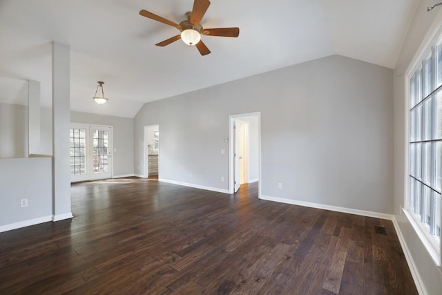 unfurnished living room with ceiling fan, dark hardwood / wood-style flooring, and lofted ceiling