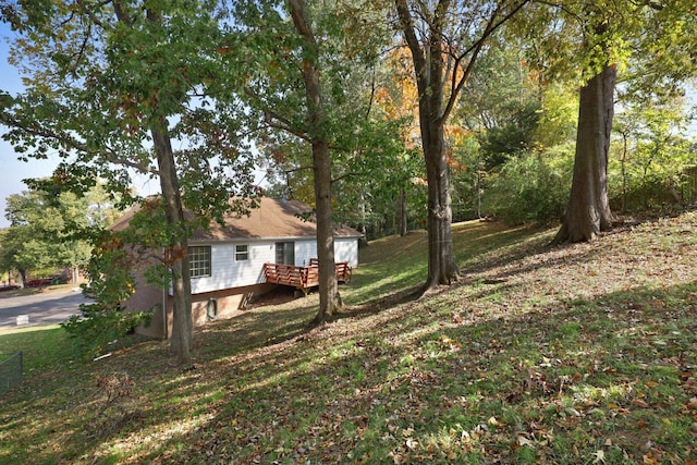 view of yard with a deck