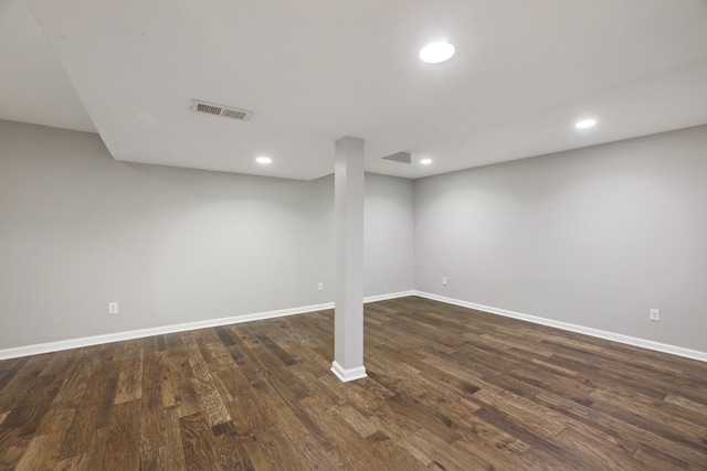 basement with dark wood-type flooring