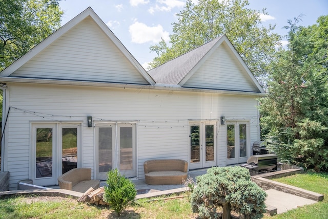 back of property with french doors