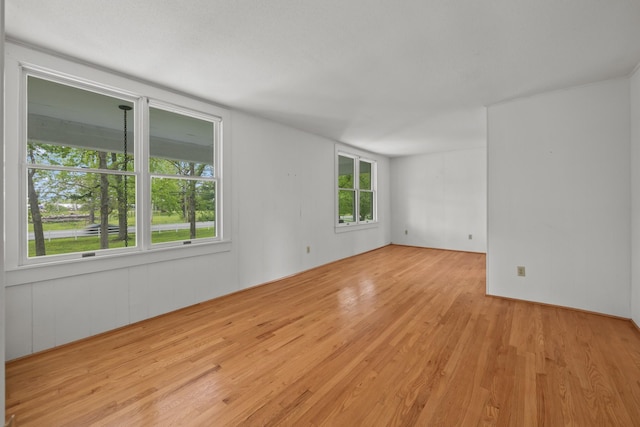 spare room featuring light hardwood / wood-style flooring