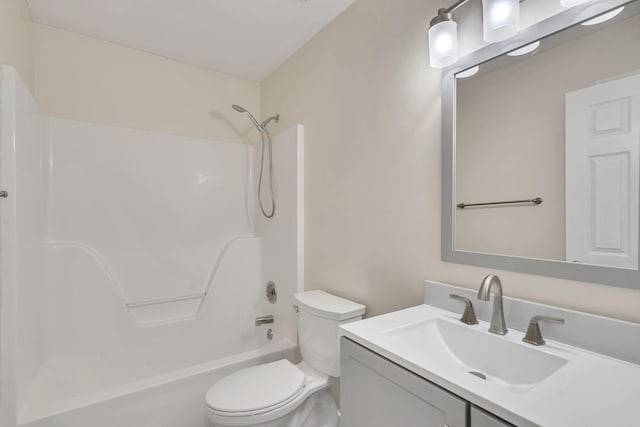 full bathroom featuring vanity, shower / bathtub combination, and toilet