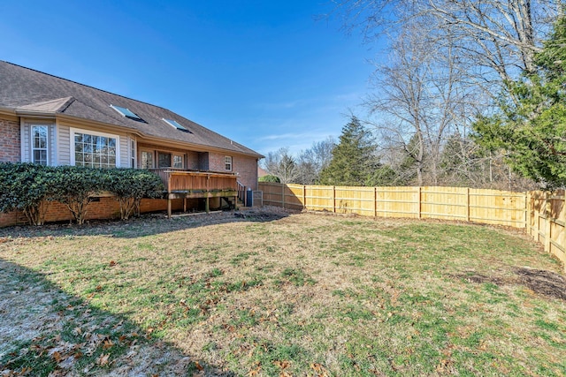 view of yard with a wooden deck