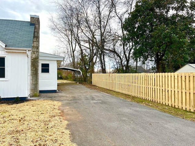 view of yard with a carport