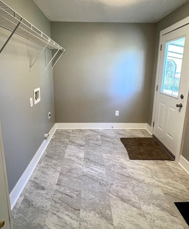 laundry room featuring washer hookup and electric dryer hookup