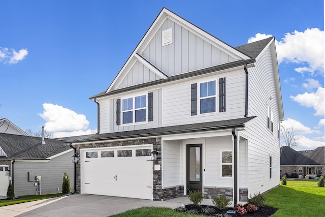 view of front facade featuring a garage and a front lawn