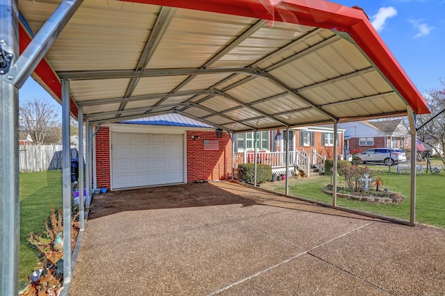 view of vehicle parking featuring a lawn and a garage