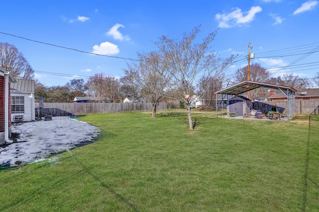 view of yard with a carport