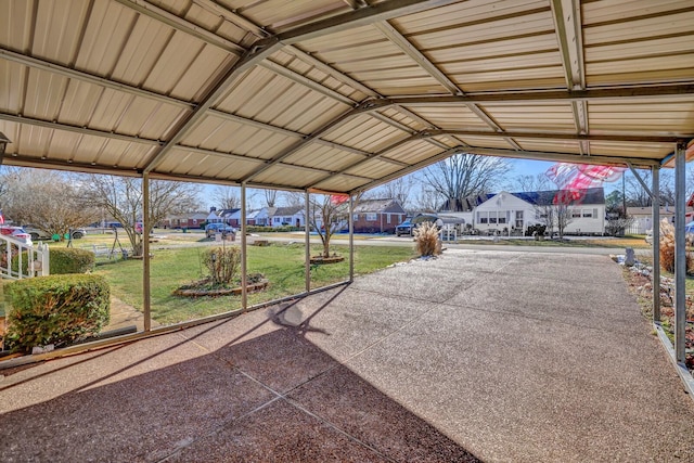 view of patio / terrace with a carport