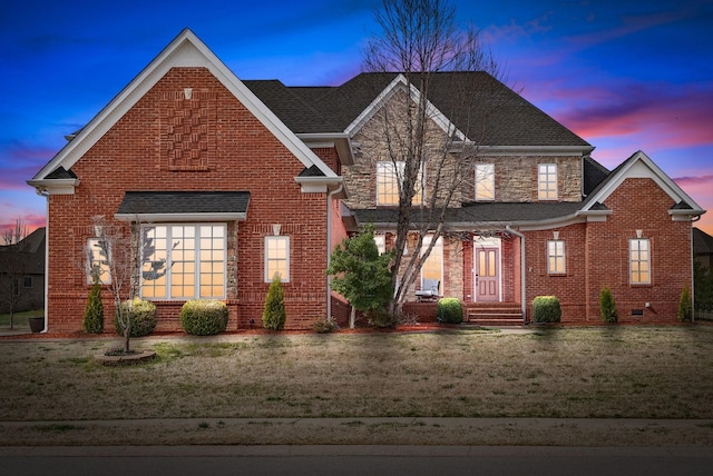 front facade with a yard