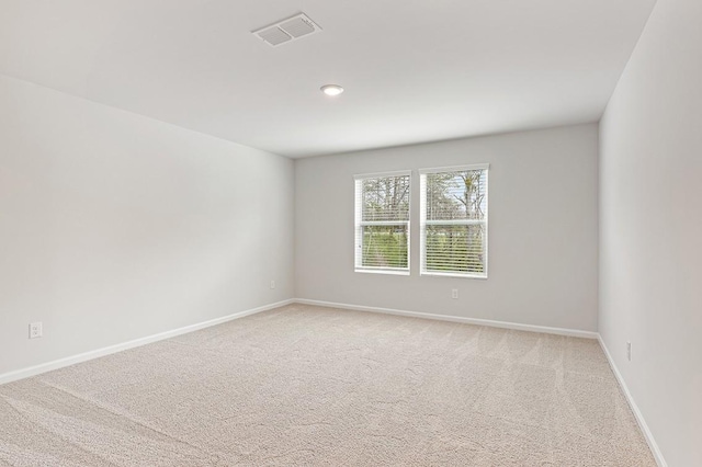 empty room with carpet flooring