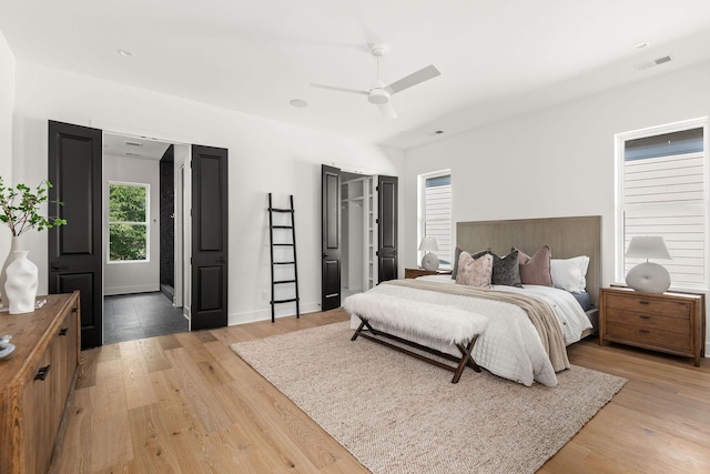 bedroom featuring hardwood / wood-style floors and ceiling fan