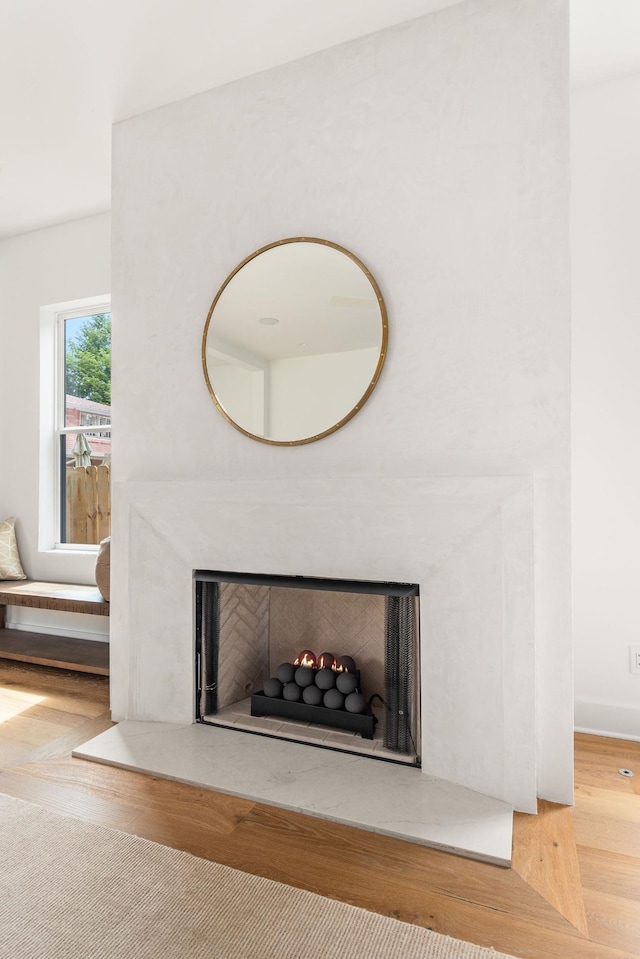 interior details featuring a multi sided fireplace