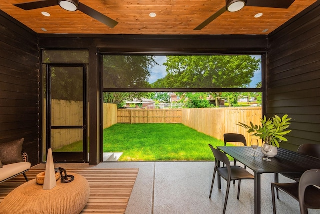 sunroom with wood ceiling