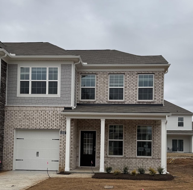 view of front of home with a garage