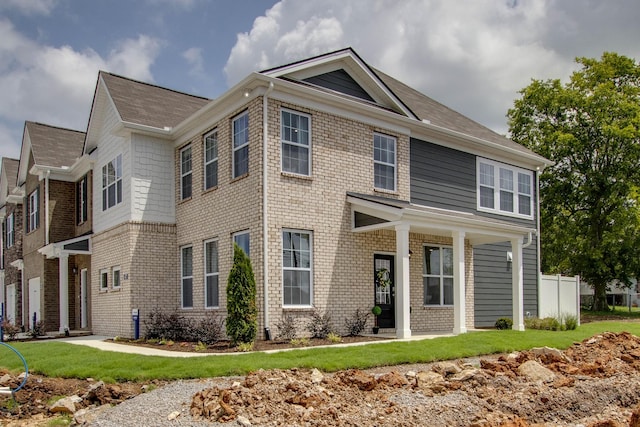 view of front of home with a front lawn