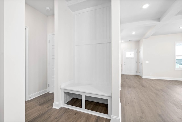 mudroom with coffered ceiling, hardwood / wood-style flooring, and beamed ceiling