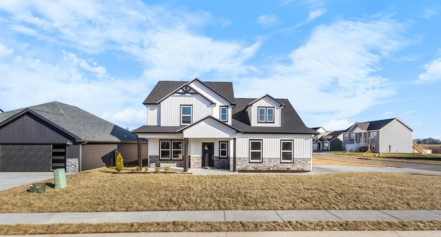 view of front facade featuring a garage and a front yard