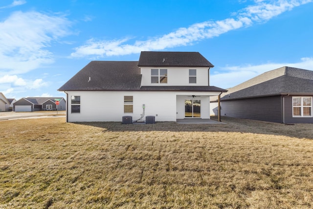 back of house with ceiling fan, a yard, a patio area, and central air condition unit