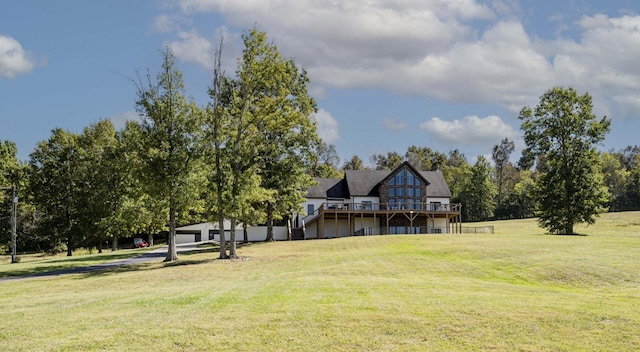 view of yard featuring a wooden deck