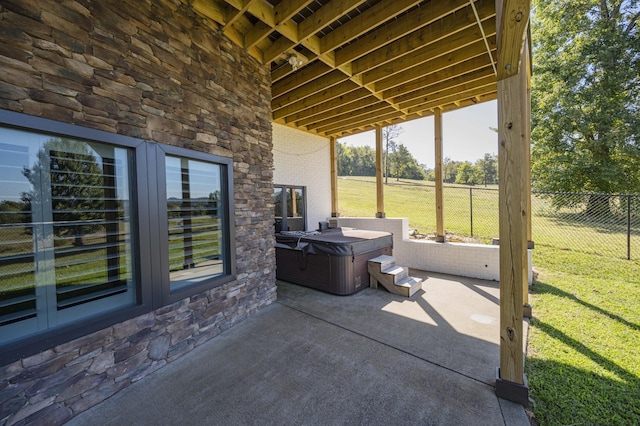 view of patio featuring a hot tub