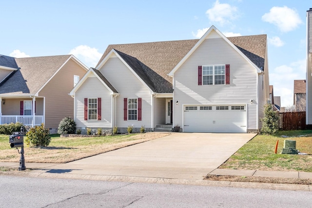 front of property featuring a garage and a front lawn