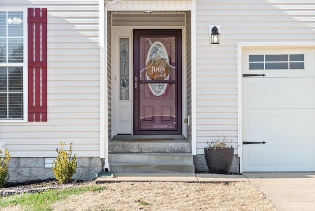 property entrance with a garage