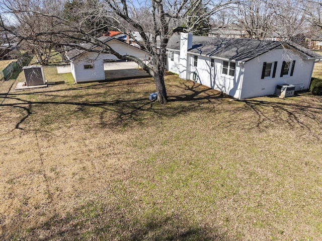 view of yard featuring central air condition unit